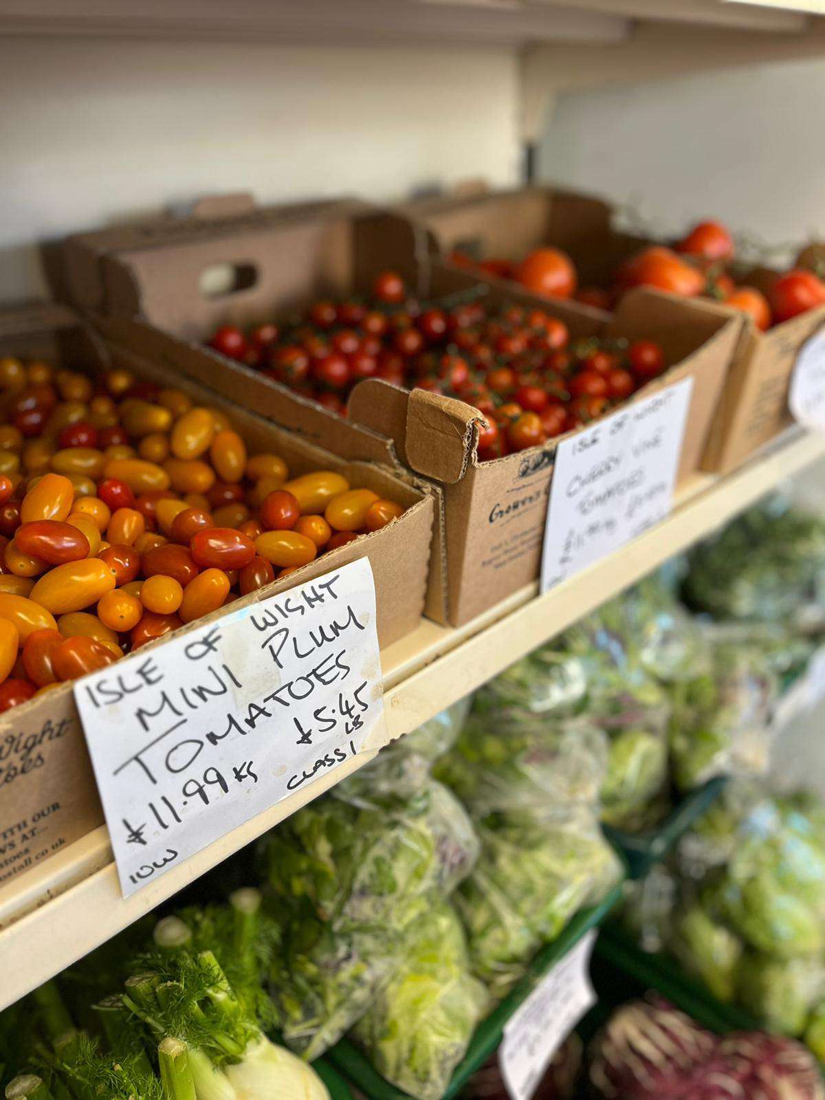 Fully stocked shelves in independent farm shop, Dorset; image credit